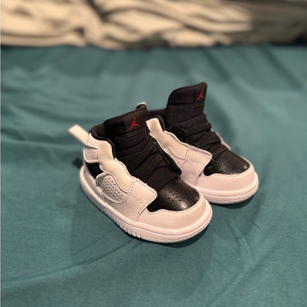 Jordan Kids Black and White High-Top Sneakers